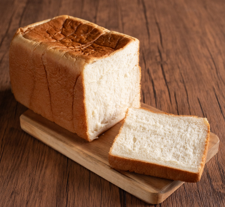 A loaf of Japanese shokupan, a soft white bread commonly enjoyed for breakfast and light meals in Japan.